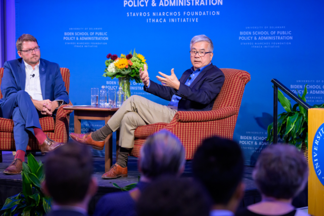 Senior Fellow Gary Locke speaking to a crowd with Dr. Tim Shaffer