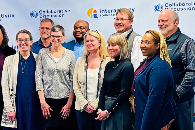 SNF Ithaca Visiting Fellow Shannon Wheatley Hartman, PhD posing for a photo with a group of people