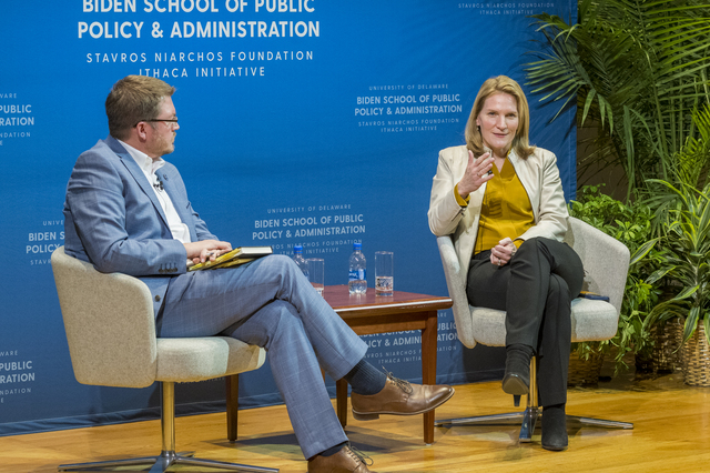 SNF Ithaca Visiting Fellow Cynthia Miller-Idriss, PhD speaking on stage next to Dr. Tim Shaffer