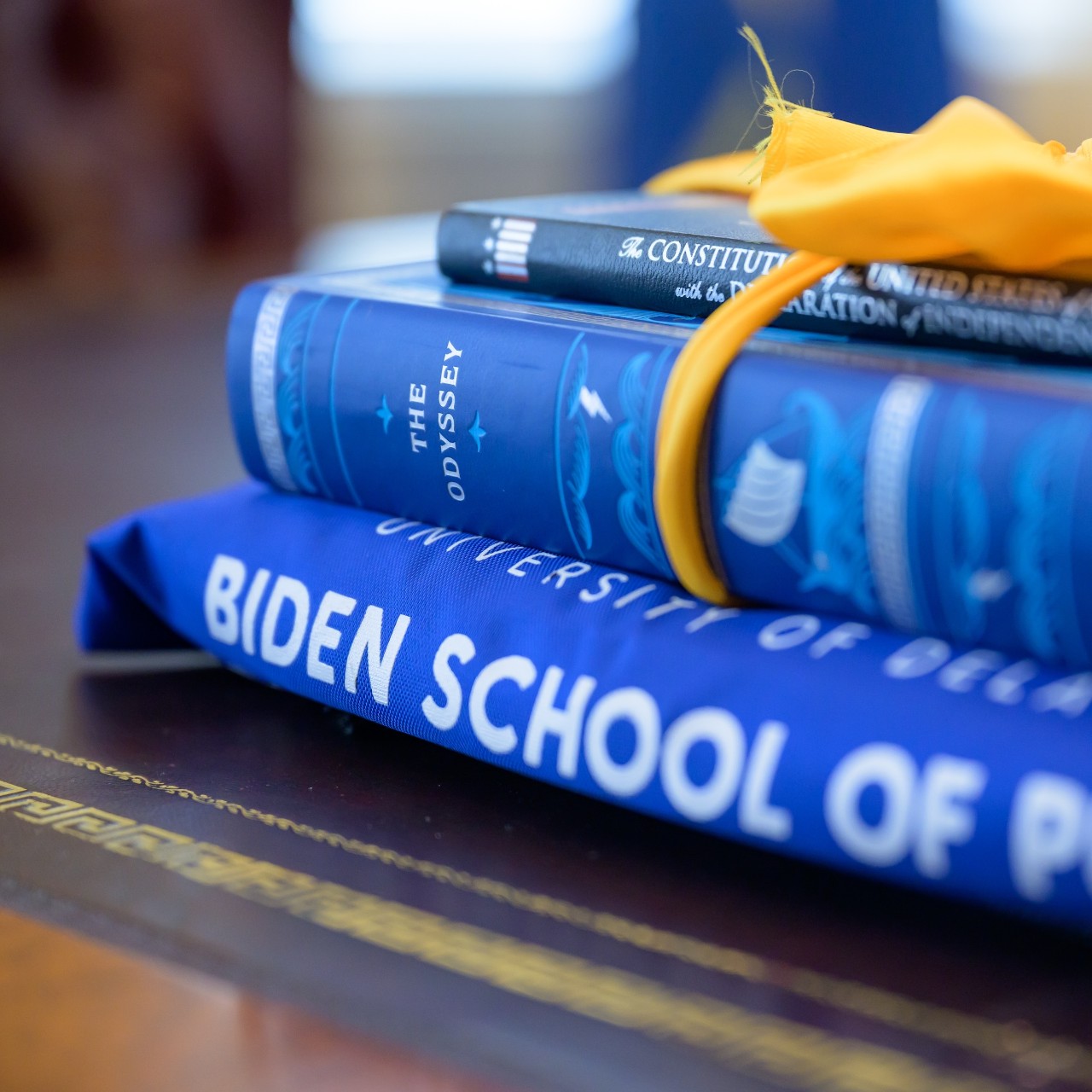 Books stacked for SNF Ithaca Welcome Reception