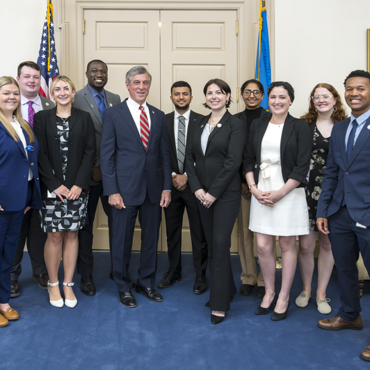 Legislative Fellows pose for a photo with Governor Carney