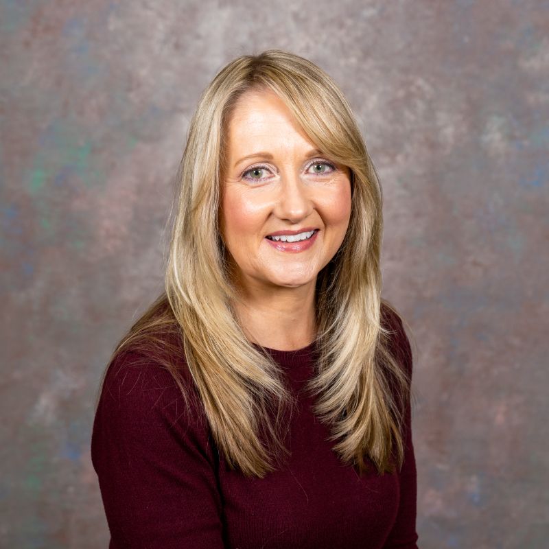 Headshot photo of Catherine Conrad