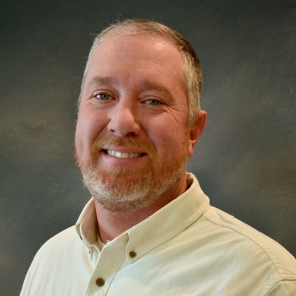 Headshot photo of James Adkins