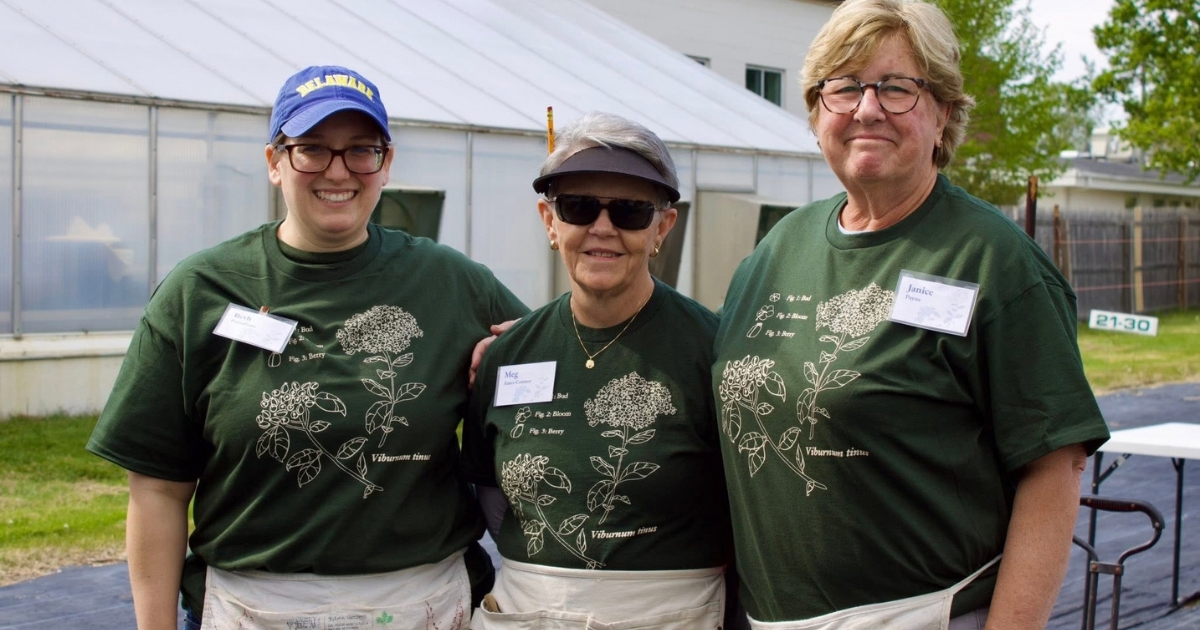 A photograph of volunteers in their signature t-shirts.
