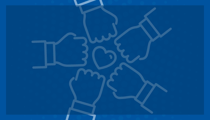 A simple graphic featuring all hands in, supporting a heart.