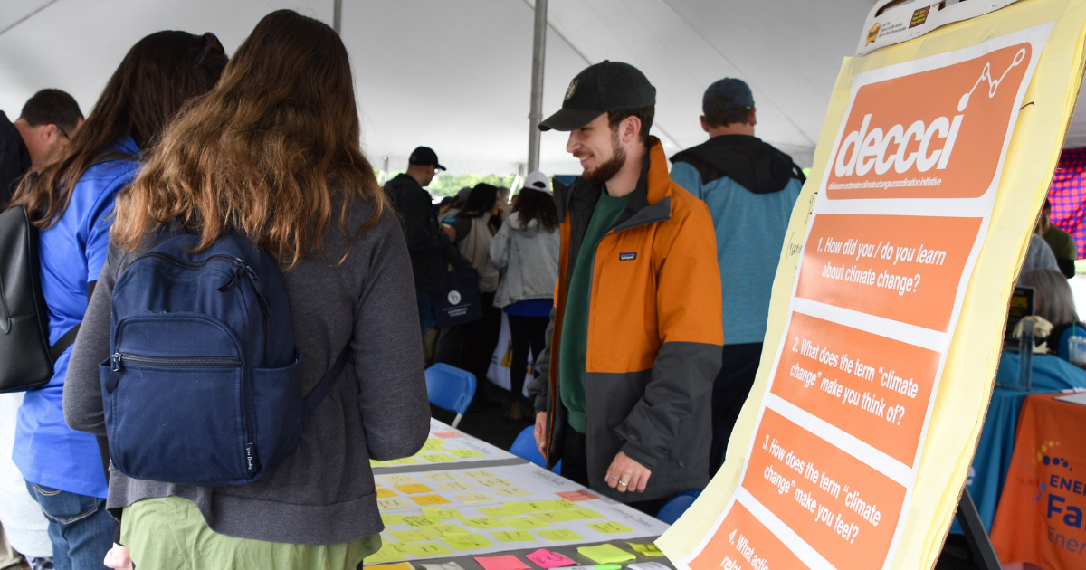 DECCCI Student Scholar, Wylie Feaster chats with visitors to UD's Ag Day in 2023.