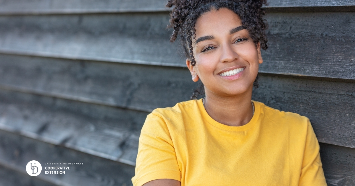 A female teen smiling A female teen smiling