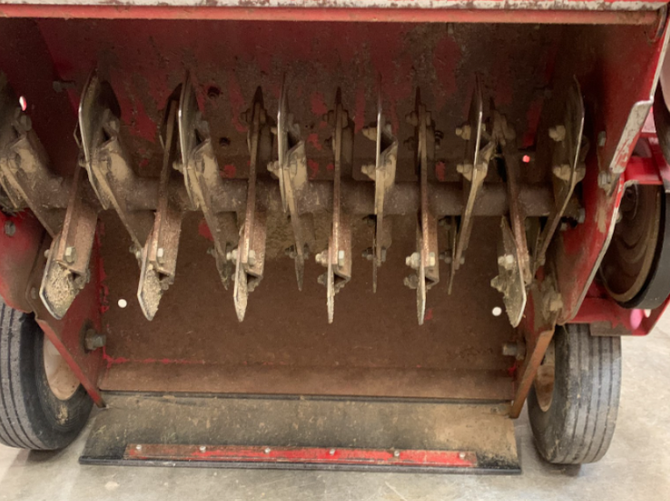 Fig. 2. Evenly spaced, spinning vertical blades of a verticutting machine