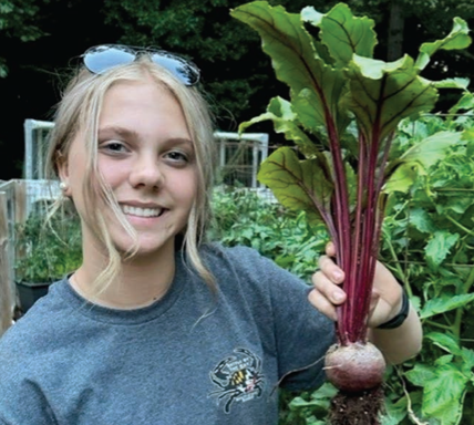 Juliette Anger, Bridgeville Mustangs, Sussex county, showcases beets at the 2023 Delaware State Fair. 