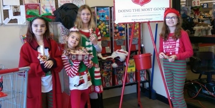 Lord Baltimore 4-H club members ring the bell to collect donations for the Salvation Army. 