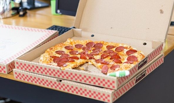 Pizza in a takeout box.