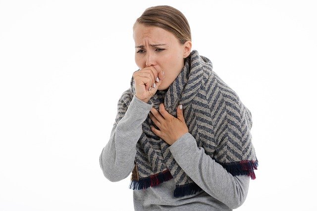 A person coughing.