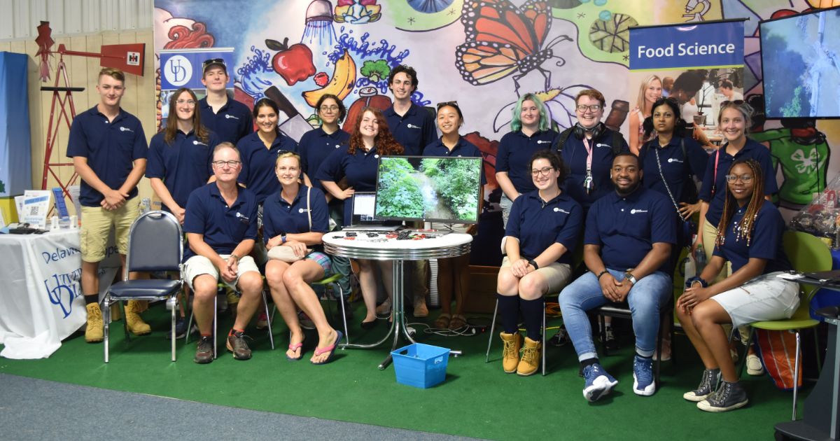 A group photo of University of Delaware Summer Scholars at the Delaware State Fair