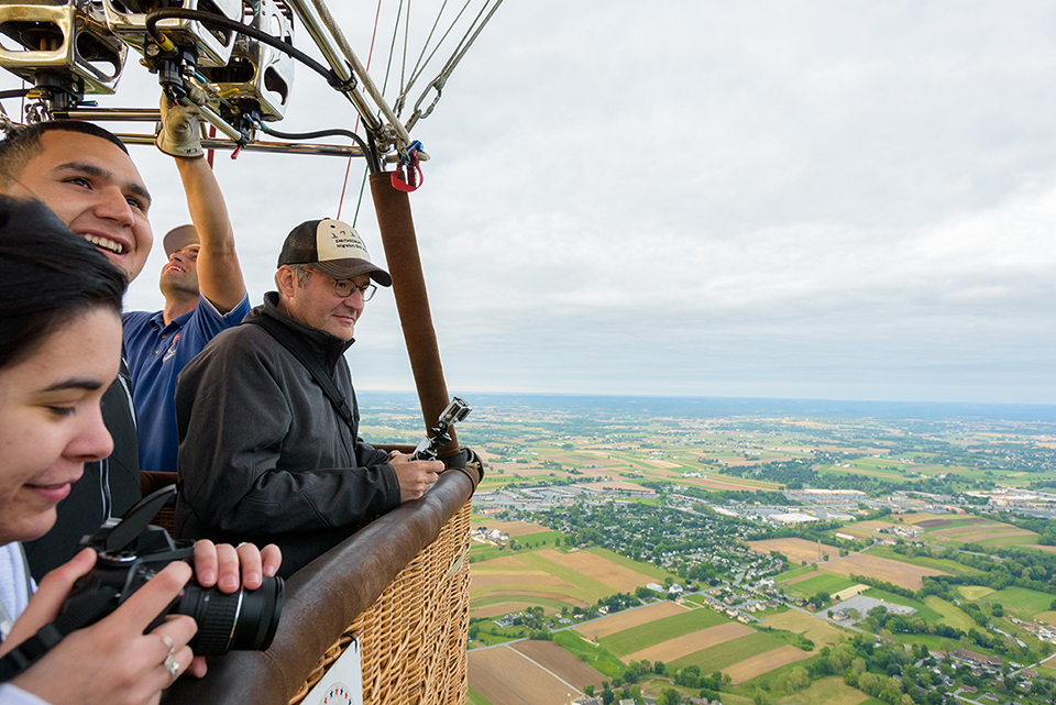 Jeff Buler, assistant professor of entomology & wildlife ecology, and students from his master's level seminar in landscape ecology (ENWC667) take a flight in a hot air balloon to get a bird's-eye view of the landscape over Lancaster County, PA. - (Evan Krape / University of Delaware)