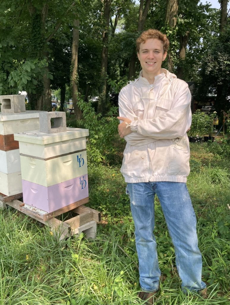 Jack posing with the hives.