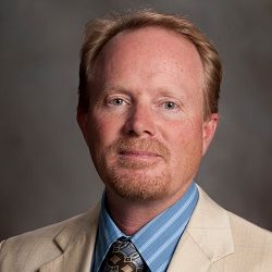 Headshot photo of Professor Erik Ervin