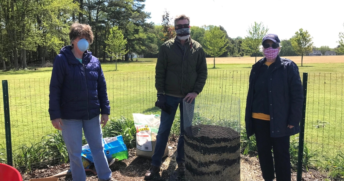 Three master gardeners with their foster garden.