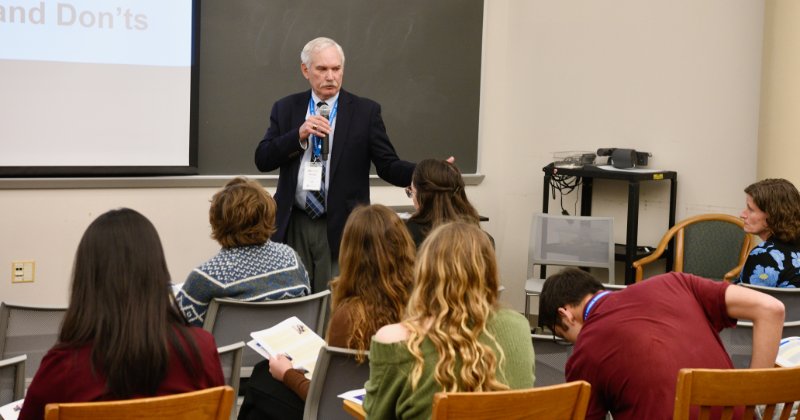 Michael Scuse at 2023 career event Michael Scuse speaks in front of a classroom of students.