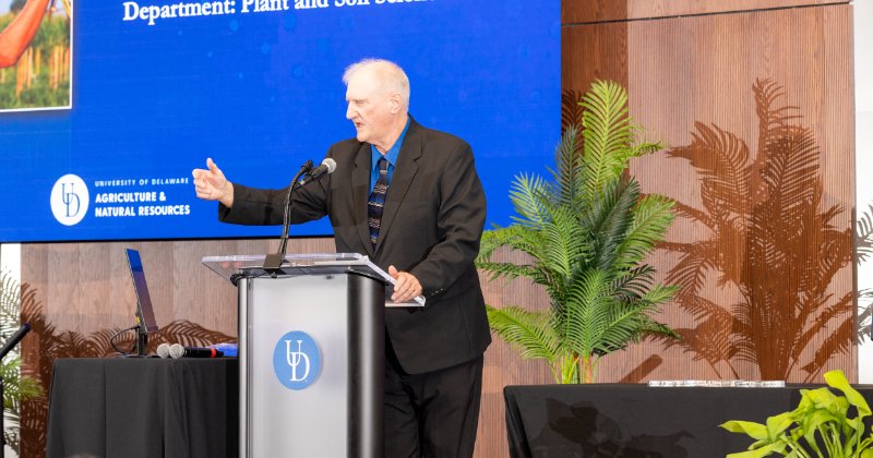 Gordon Johnson at the podium in the Tower at STAR.