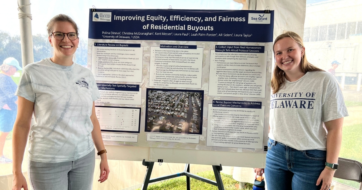 Christina McGranaghan and Laura Taylor Prof. Christina McGranaghan and graduate student Laura Taylor present a poster at Coast Day 2023. Taylor’s thesis project is affiliated with a bigger project looking to improve home acquisition strategies and perceptions.