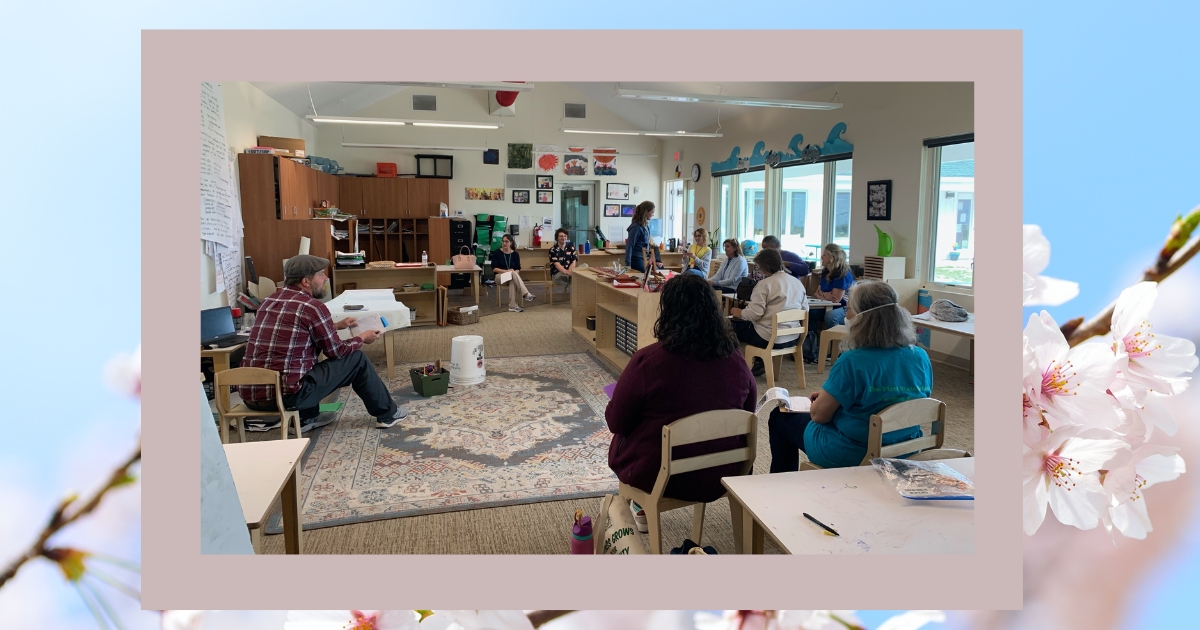 A large group of volunteers in a room A large group of volunteers in a room
