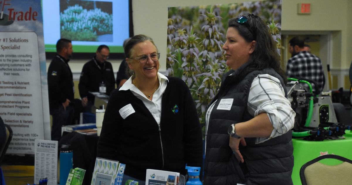 Beth Ginter and Melissa Dombrowski from the Chesapeake Conservation Landscape Council were among the exhibitors. Two exhibitors chatting at the trade table.
