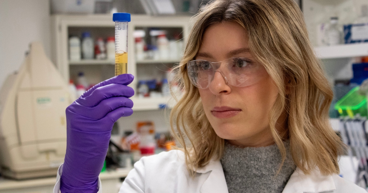 Copy of _website_properties_img_canr_1200x630 - 1 Mackenzie Sharp examines a sample in the lab.