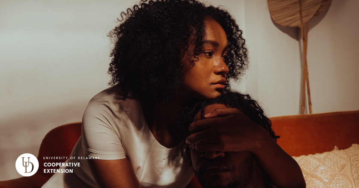 A woman hugging someone in need A woman hugging someone in need
