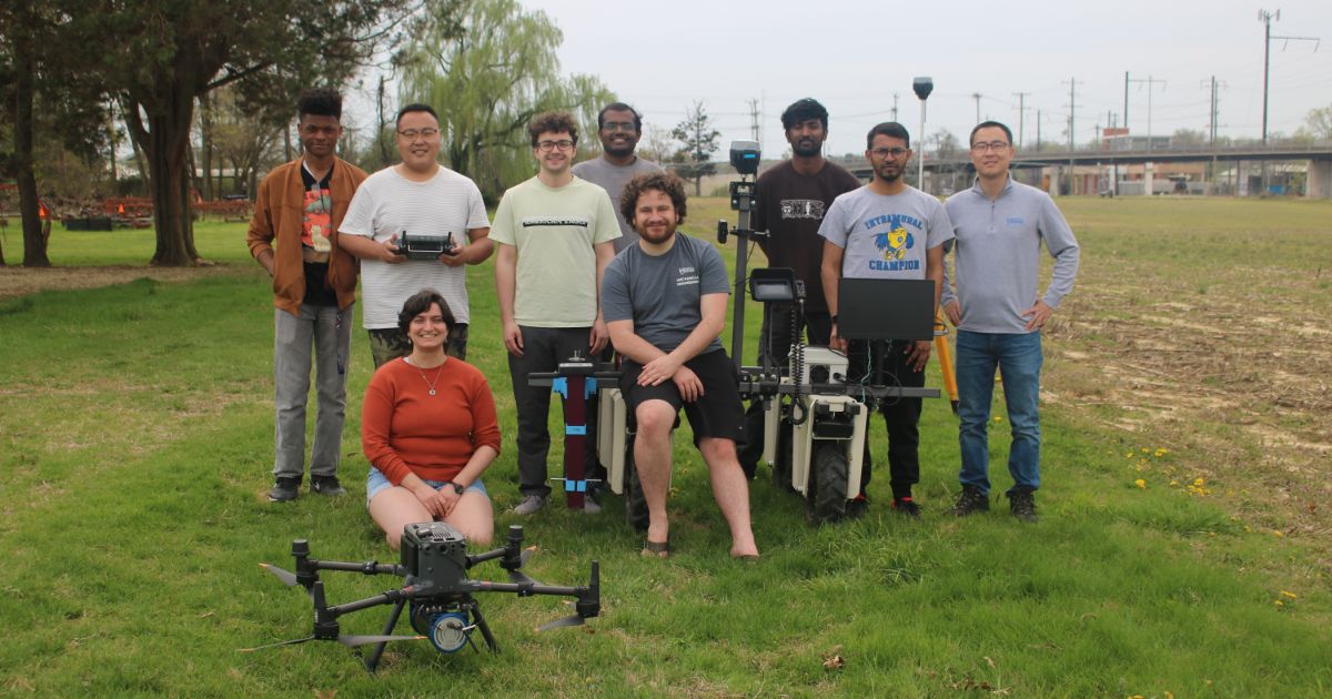 The UD Salty Blue Hens team members pose together for a photo.