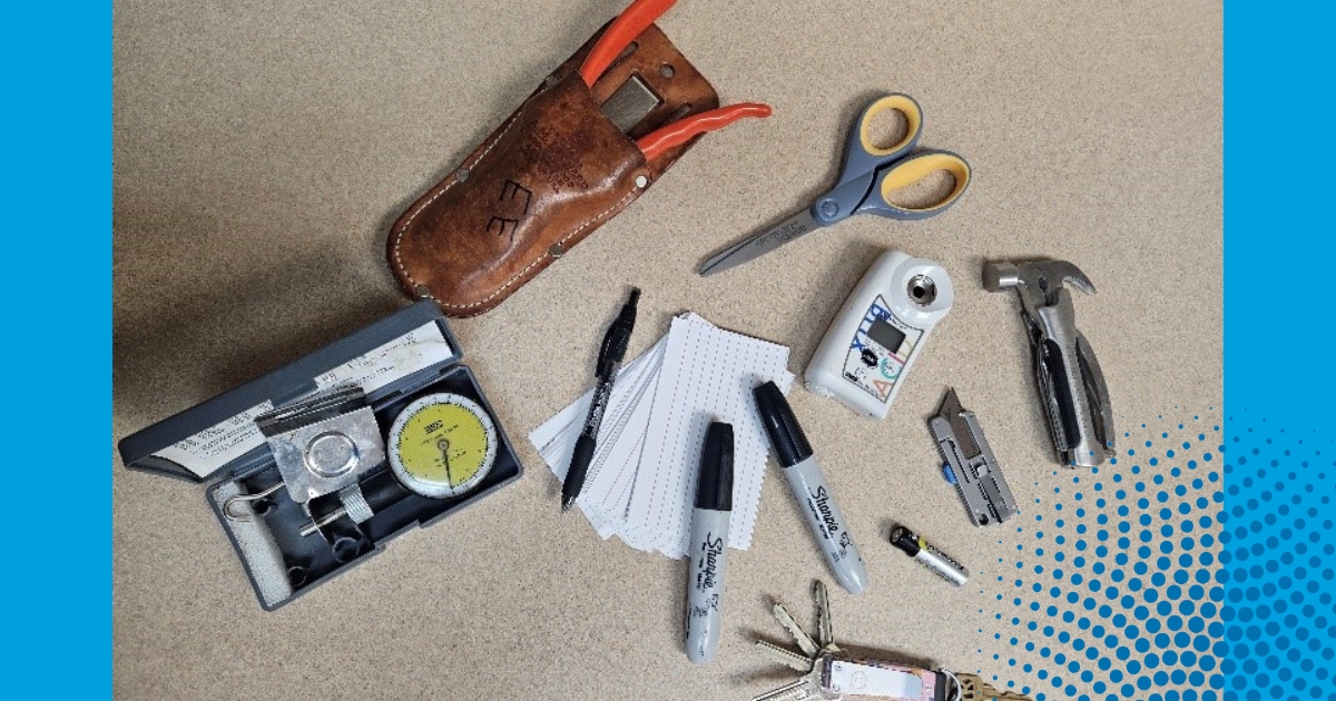 Various items which could be found in my pockets at any given time, including keys, pruners, scissors, multi-tool, box cutter, produce quality measurement tools, and of course, writing utensil with note cards. Photo by: Lyndsie Mikkelsen