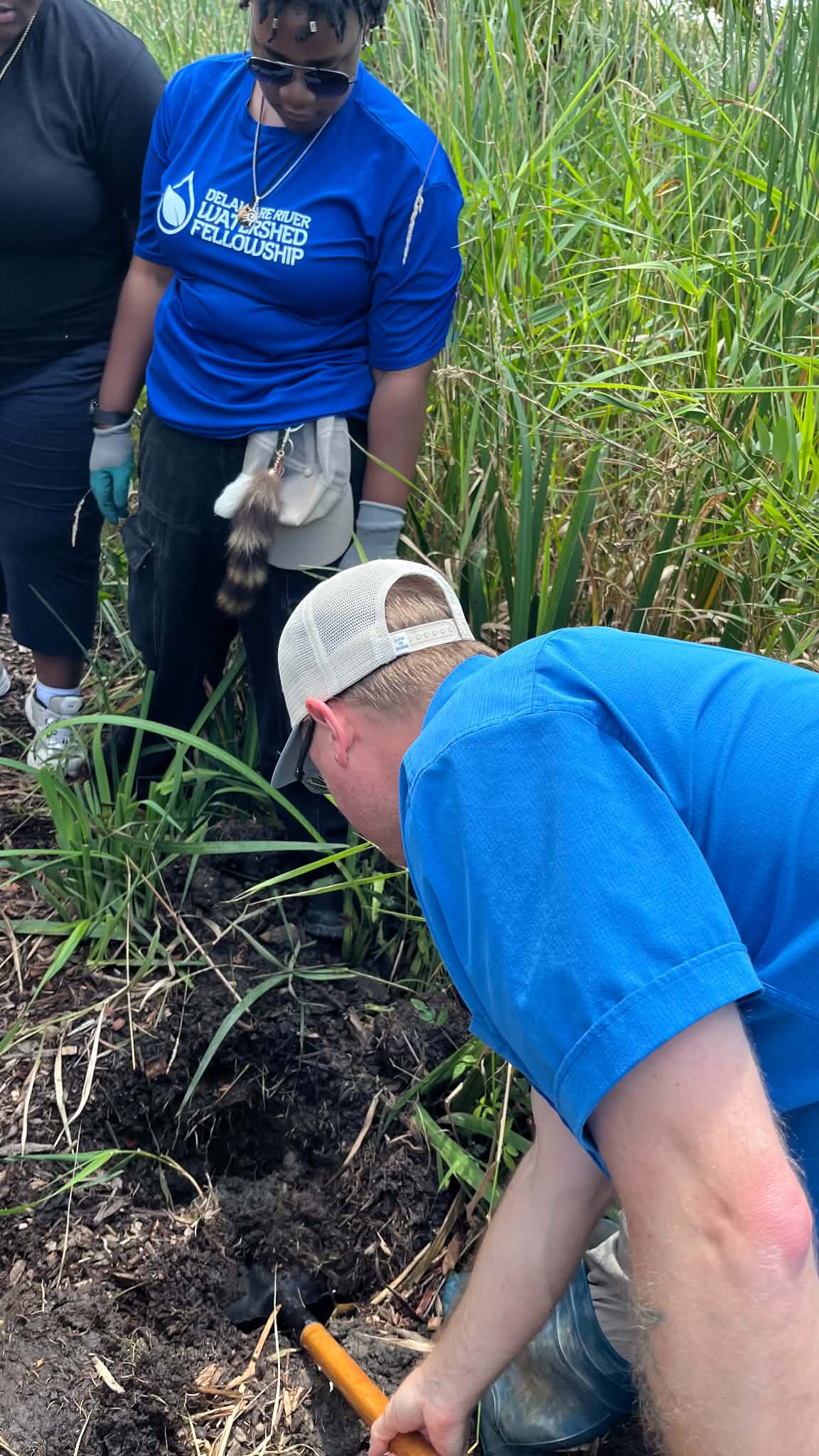 Moore demonstrates how textural differences in the soil affect its ability to hold water.