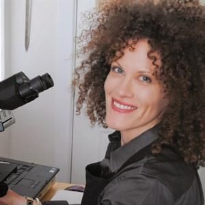 Headshot photo of Emily MacDonald-Korth