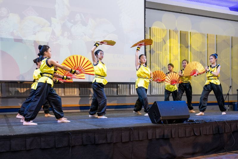 Young artists from the Chinese American Community Center performing on stage Young artists from the Chinese American Community Center performing on stage