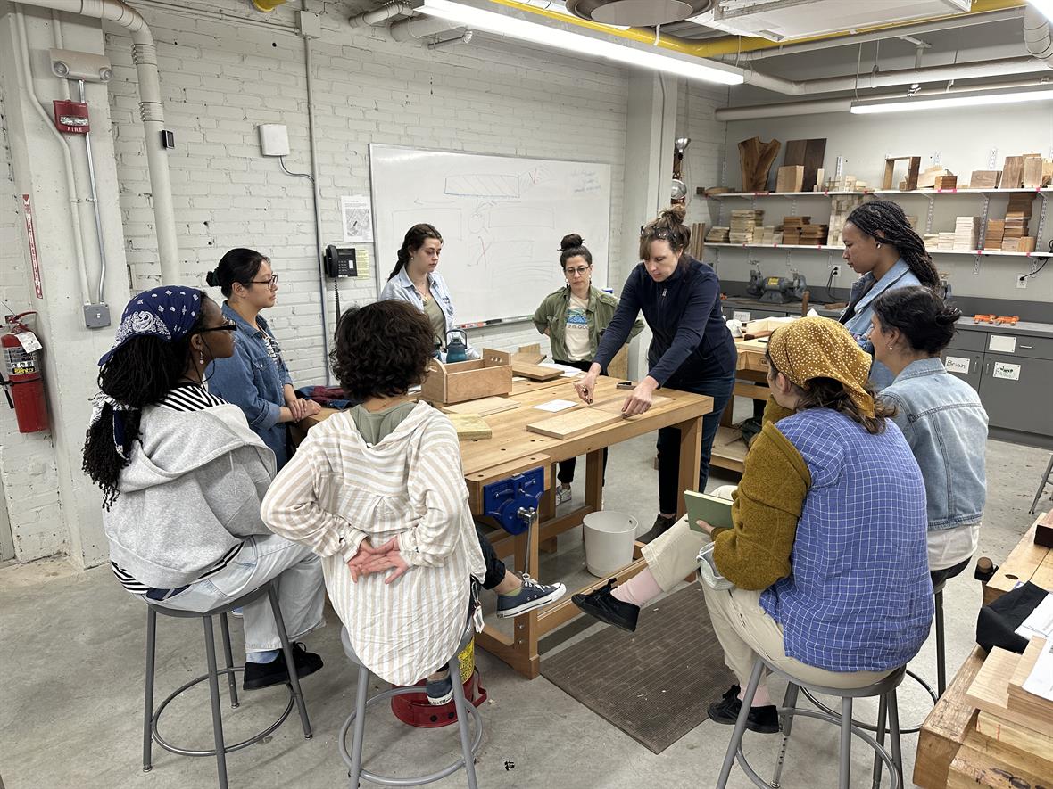 Christine Storti discusses a current project in the MFA Boston lab. Students learning in lab