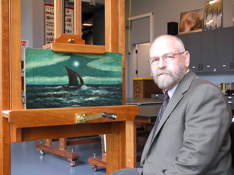 Carl examining a Ryder painting Carl examining a Ryder painting