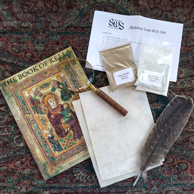 Historical art objects on a rug, including