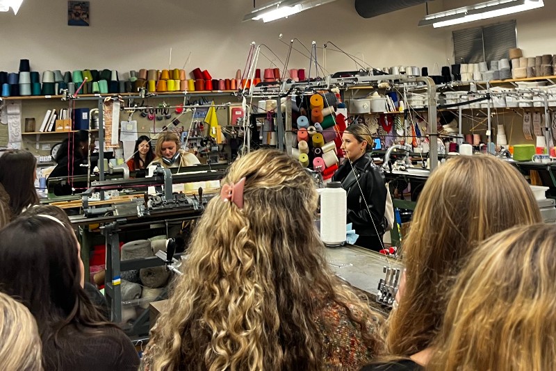 Students visited URBN’s knit lab, where new products are developed and tested.