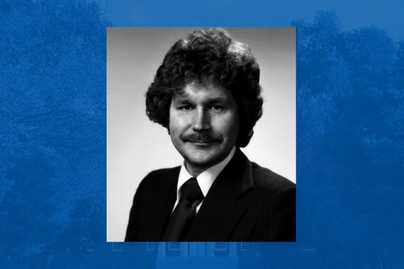 Ken Haas black and white headshot on blue background with image of UD campus.