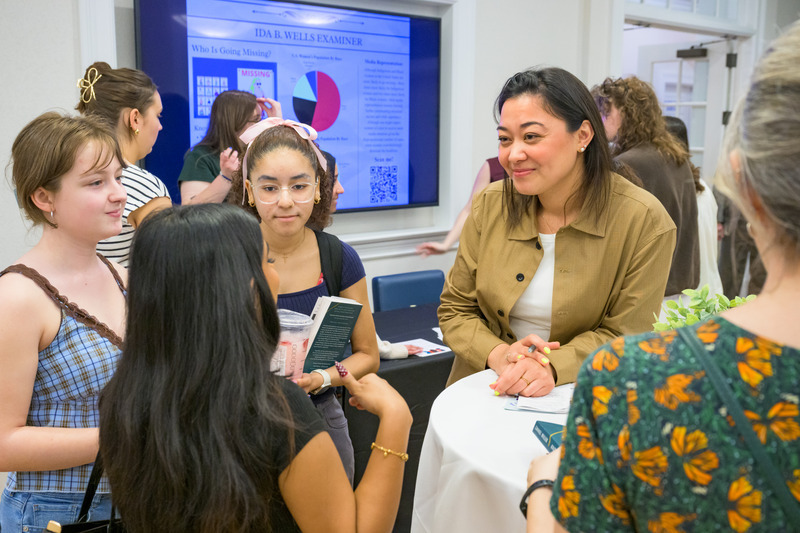 Miller quickly put the students at ease while engaging with them at the capstone presentation class.
