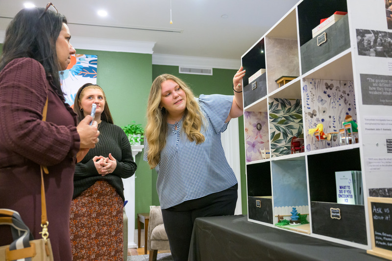 Another group made a dollhouse that showed the impact of immigration enforcement on communities.