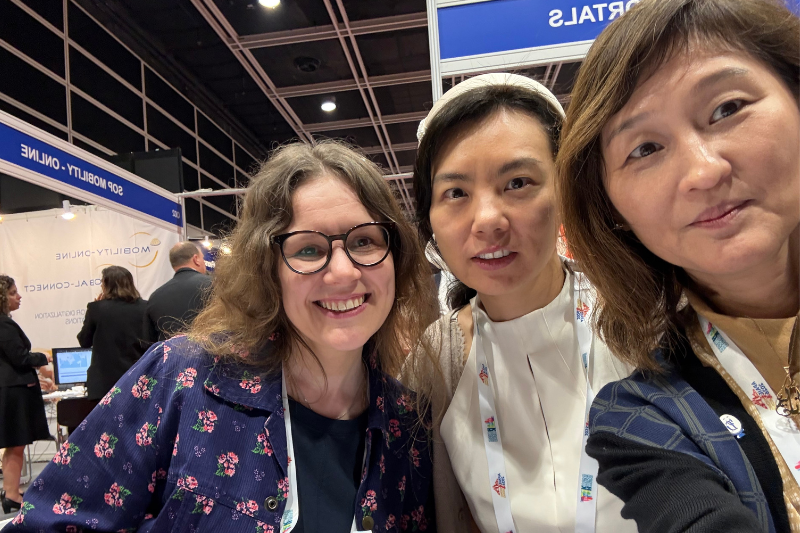 (Left to right) Elena Mansurova; director of international affairs, Emily Liu; ELI recruiter and Ana Kim at APAIE.