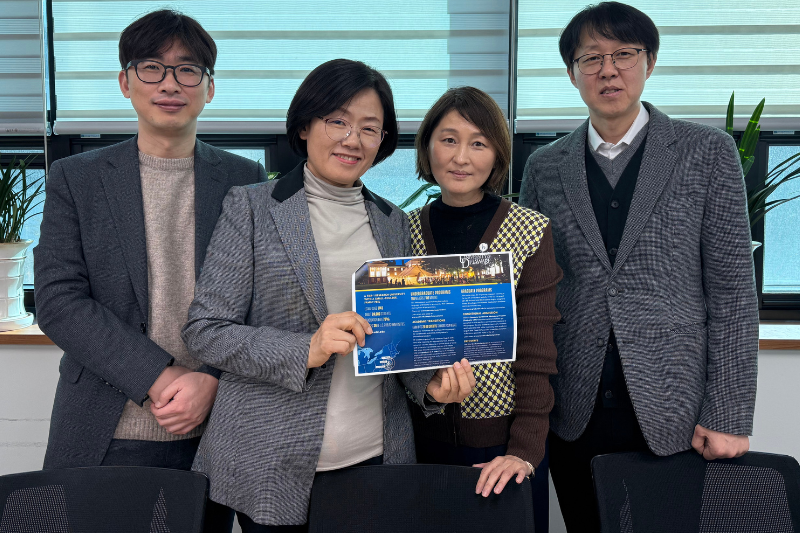Ana Kim is pictured with a woman and two men who work at City of Uiwang.