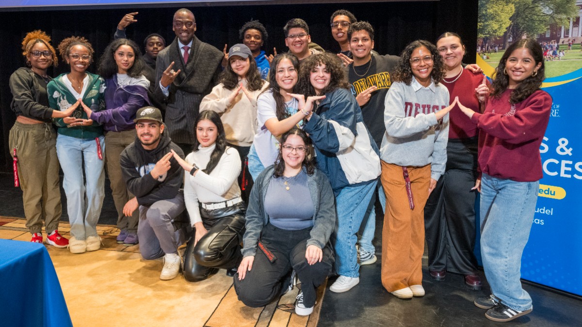 Yusef Salaam, NY City Council member in group photo with students after an event.