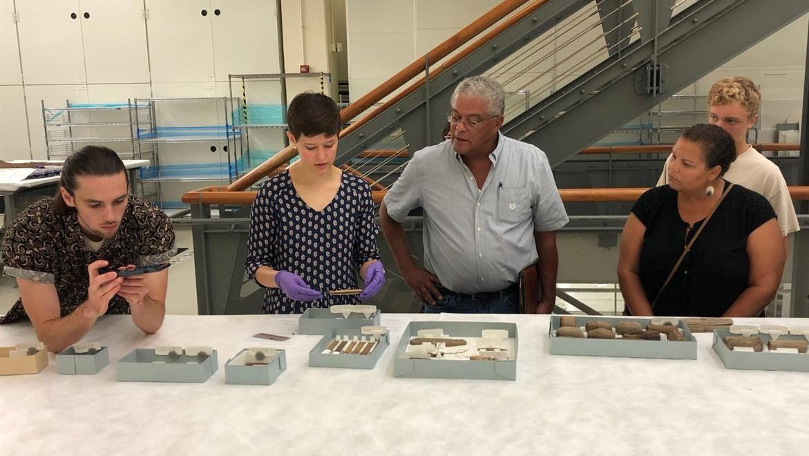 ​Bellie Fichtner and members of the Lenape Indian Tribe of Delaware examine fishing nets at the Smithsonian's National Museum of the American Indian's Cultural Resource Center. ​