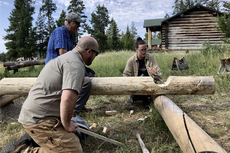 ​Cassman Award recipient Morrigan Kelley refining the saddle notch with a chisel 
