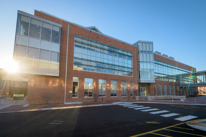 Modern glass and brick building on a university campus