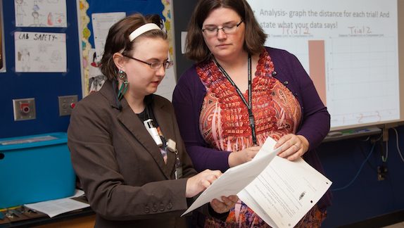 Biological sciences students teaching in a classroom
