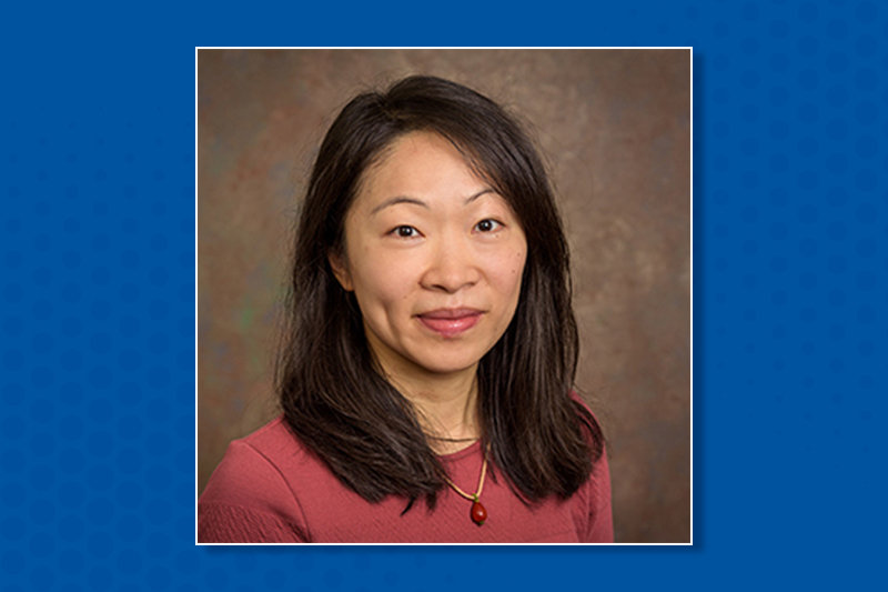 Hsin-Wen Lee headshot on blue background
