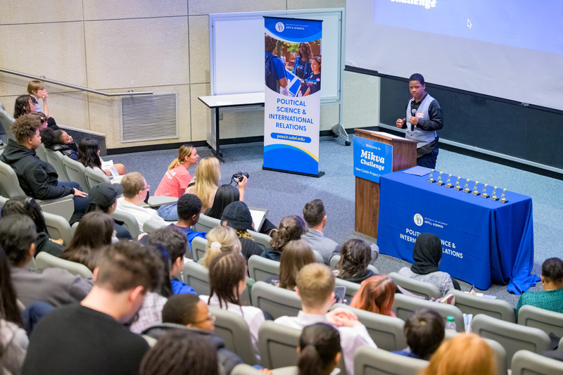 Student teaching a lecture