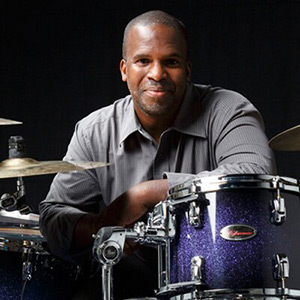 Will Kennedy playing drums